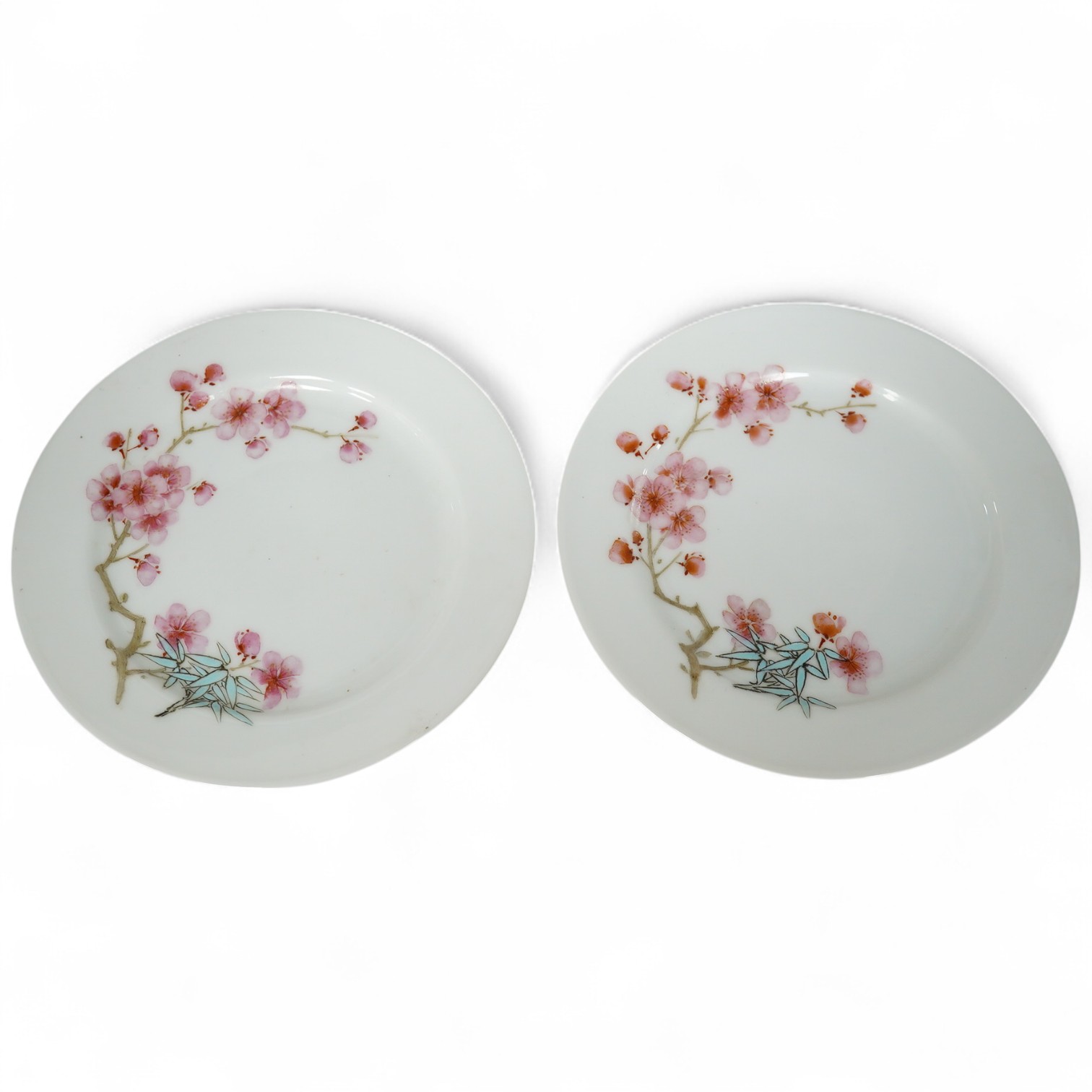 A pair of Chinese plum blossom plates, Mao Zedong pattern, 15cm diameter. Condition - good.